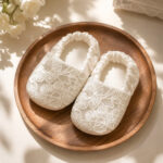 White lace baby booties with floral embroidery for baptism and christening outfits